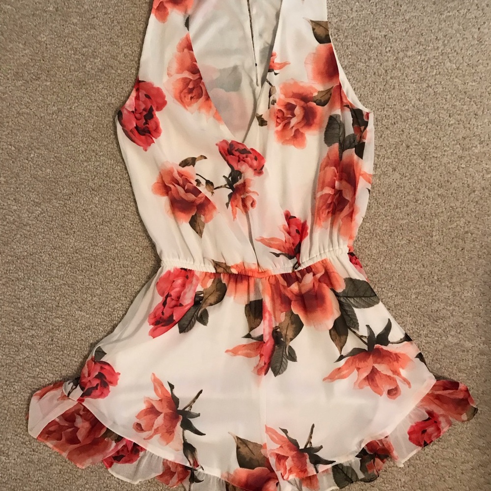 Beautiful Show Me Your Mumu floral romper!
